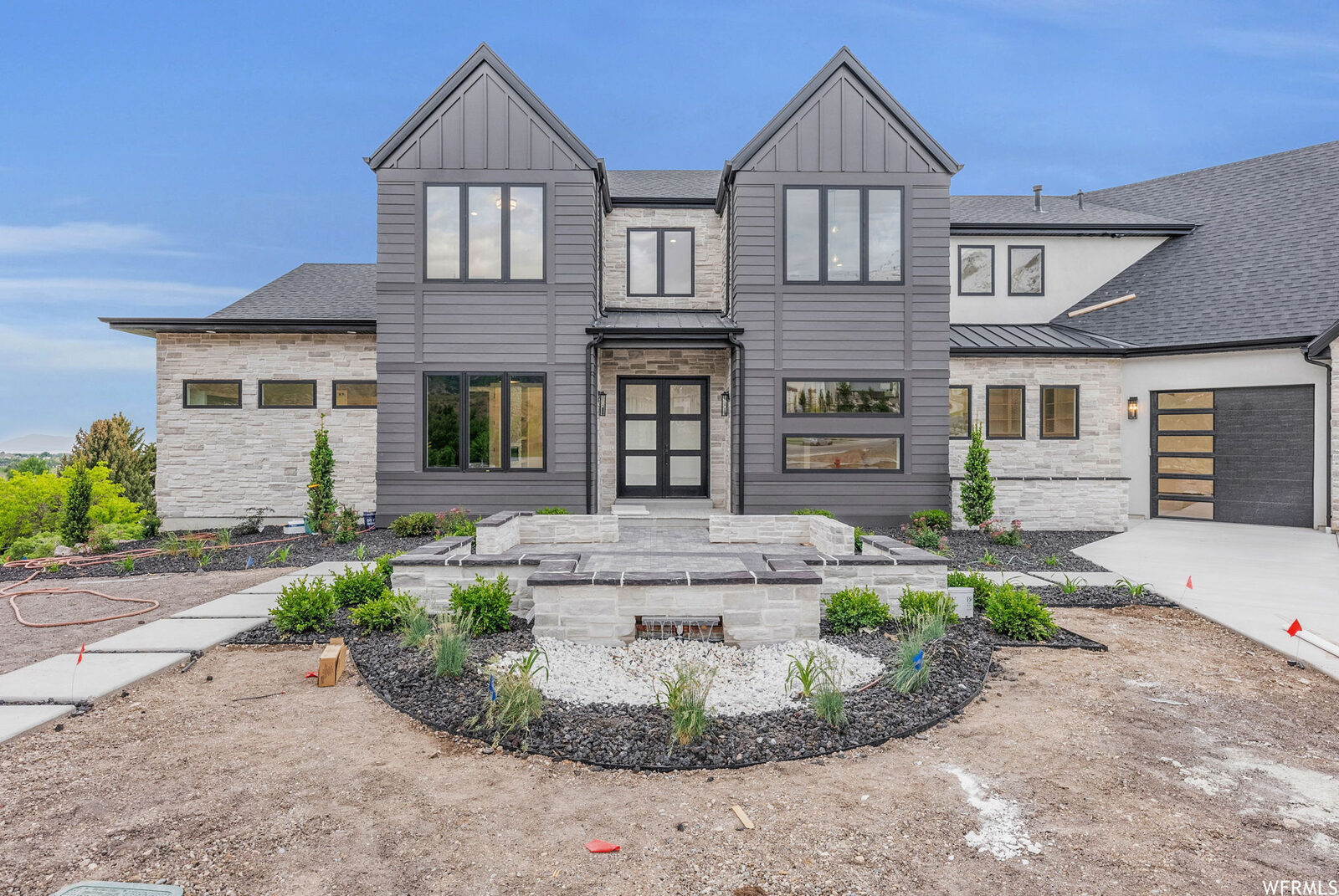 Front elevation of 989 N Deer Crest Lane before landscaping