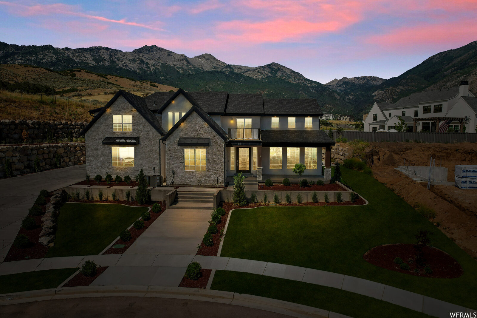 19 E Elk Court at twilight with the Wasatch range behind it